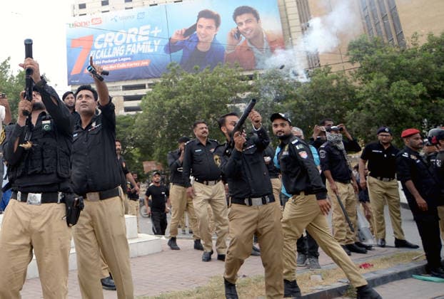 RECORD DATE NOT STATED Police officials restore baton charge, fire tear gas and arrest to repel protesters during the protest demonstration of Tehreek-e-Insaf (PTI) for release of PTI Founder Imran Khan, at Fawara Chowk nearby Karachi press club on Wednesday, August 5, 2026. Pakistan Tehreek-e-Insaf (PTI) launched countrywide protests on August 5, 2026, to mark three years of imprisonment of party founder Imran Khan and to demand his immediate release. (S.Imran Ali PPI Images). EDITORIAL USE ONLY Copyright: xx AR-ZM-050826x ppiphotos484822