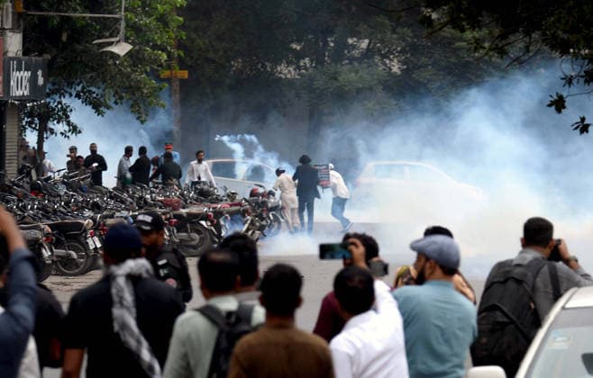 RECORD DATE NOT STATED Police officials restore baton charge, fire tear gas and arrest to repel protesters during the protest demonstration of Tehreek-e-Insaf (PTI) for release of PTI Founder Imran Khan, at Fawara Chowk nearby Karachi press club on Wednesday, August 5, 2026. Pakistan Tehreek-e-Insaf (PTI) launched countrywide protests on August 5, 2026, to mark three years of imprisonment of party founder Imran Khan and to demand his immediate release. (S.Imran Ali PPI Images). EDITORIAL USE ONLY Copyright: xx AR-ZM-050826x ppiphotos484823