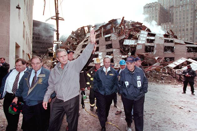 September 14, 2001, New York City, New York, USA: U.S. President George W. Bush waving while touring 7 World Trade Center disaster site with (from left) New York Congressman Jerrold Nadler, Director of New York CityÃ¢â‚¬â ¢s Office of Emergency Management Richard J. Sheirer, U.S. from New York Senator Hillary Rodham Clinton, New York Governor George Pataki, New York Fire Department Commissioner Thomas Von Essen, U.S. Senator from New York Chuck Schumer, New York City Mayor Rudolph Giuliani and Chief of Staff Joe Hagin, Financial District, Manhattan, New York City, New York, USA, Paul Morse, George W. Bush White House Photo Office, September 14, 2001 New York City USA - ZUMAg145 20010914_zap_g145_004 Copyright: xJTxVintagex