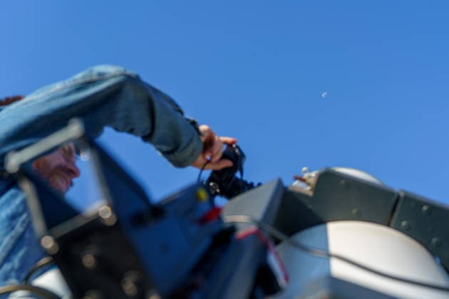 German astronomers observe the Moon while expecting Falcon 9 lunar impact. Germany - Kassel, 05.08.2026 Mark Woskowski from the Astronomical Working Group Kassel (Astronomischen Arbeitskreis Kassel e.V.) adjusts the telescope to observe the Moon surface from their platform of the Observatory Kassel, during an international observation campaign following the predicted impact of a SpaceX Falcon 9 upper stage near the lunar Einstein crater. Astronomers around the world attempted to record the artificial lunar impact, which was expected after a discarded rocket stage entered a collision course with the Moon. Due to the observation conditions from Germany, no visible flash or ejecta plume could be detected. Hesse