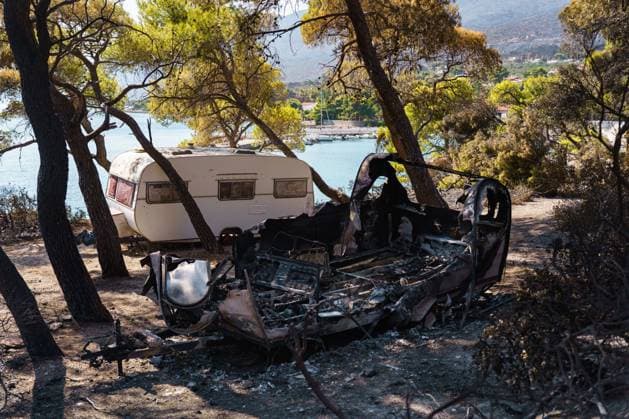 Residents return to wildfire-ravaged homes in western Attica PORTO GERMENO, WEST ATTICA, GREECE AUGUST 5, 2026: Extensive destruction caused by a major wildfire is seen in Porto Germeno, western Attica, four days after the fire swept through the area. More than 50 homes sustained damage ranging from partial destruction to complete collapse. Recovery and assessment operations continue as crews clear debris and inspection teams from Greece s General Secretariat for Natural Disaster Recovery evaluate damaged properties. Parts of the area remain without electricity and running water while restoration efforts continue. Porto Germeno Greece Copyright: x xRomanosxLioutasx xJNAxPressx