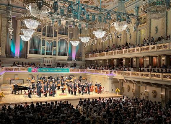 BERLIN, GERMANY - AUGUST 05: Musicians from the Zhejiang Conservatory of Music Youth Symphony Orchestra stand to acknowledge applause during a concert at the Konzerthaus Berlin as part of the 27th European Youth Classical Music Festival on August 5, 2026 in Berlin, Germany. The festival showcases young classical talent from across Europe and beyond.  Copyright: xChinaxNewsxServicex 111658385344