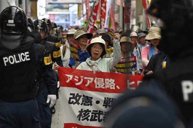 Japan marks 81st anniversary of the atomic bombing of Hiroshima HIROSHIMA, JAPAN - AUGUST 6 : Anti-war demonstrators march through central Hiroshima under a heavy police presence during a protest against war and the policies of Japanese Prime Minister Sanae Takaichi, in Hiroshima, Japan, on August 6, 2026. Several groups later converged near the Atomic Bomb Dome to conclude the demonstration. David Mareuil Anadolu Hiroshima Japan. Editorial use only. Please get in touch for any other usage.  Copyright: x2026xAnadoluxDavidxMareuilx