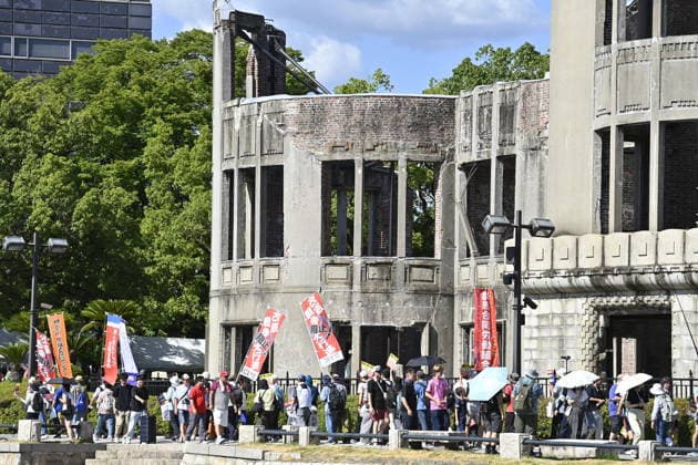 Japan marks 81st anniversary of the atomic bombing of Hiroshima HIROSHIMA, JAPAN - AUGUST 6 : Anti-war demonstrators march past the Atomic Bomb Dome during a protest against war and the policies of Japanese Prime Minister Sanae Takaichi, in Hiroshima, Japan, on August 6, 2026. Several protest groups converged near the dome in the afternoon under a heavy police presence. David Mareuil Anadolu Hiroshima Japan. Editorial use only. Please get in touch for any other usage.  Copyright: x2026xAnadoluxDavidxMareuilx