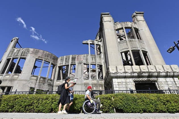 Japan marks 81st anniversary of the atomic bombing of Hiroshima HIROSHIMA, JAPAN - AUGUST 6 : A person using a wheelchair passes in front of the Atomic Bomb Dome on the day marking the 81st anniversary of the atomic bombing of Hiroshima, in Hiroshima, Japan, on August 6, 2026. David Mareuil Anadolu Hiroshima Japan. Editorial use only. Please get in touch for any other usage.  Copyright: x2026xAnadoluxDavidxMareuilx