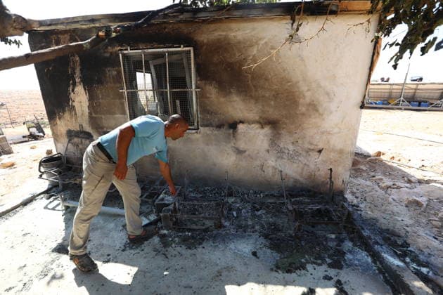 Homes burned, residents injured in Israeli settlers attack on Masafer Yatta community HEBRON, WEST BANK, PALESTINE - AUGUST 6: A Palestinian resident inspects the damage to a home that was set on fire following an attack by Israeli settlers in the Khirbet al-Tuba community in the Masafer Yatta area, south of Hebron, West Bank, Palestine on August 6, 2026. Six Palestinians, including three women, were injured and several homes were set ablaze in the attack. Wisam Hashlamoun Anadolu Hebron West Bank. Editorial use only. Please get in touch for any other usage.  Copyright: x2026xAnadoluxWisamxHashlamounx