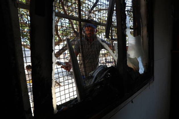 Homes burned, residents injured in Israeli settlers attack on Masafer Yatta community HEBRON, WEST BANK, PALESTINE - AUGUST 6: A Palestinian resident inspects the damage to a home that was set on fire following an attack by Israeli settlers in the Khirbet al-Tuba community in the Masafer Yatta area, south of Hebron, West Bank, Palestine on August 6, 2026. Six Palestinians, including three women, were injured and several homes were set ablaze in the attack. Wisam Hashlamoun Anadolu Hebron West Bank. Editorial use only. Please get in touch for any other usage.  Copyright: x2026xAnadoluxWisamxHashlamounx