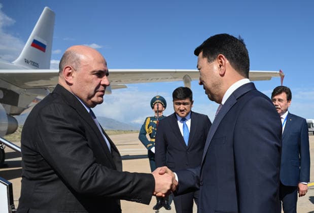 Kyrgyzstan Eurasian Intergovernmental Council 9218139 06.08.2026 Russian Prime Minister Mikhail Mishustin is welcomed by Kyrgyz Deputy Prime Minister - Minister of Water Resources, Agriculture and Processing Industry Erlist Akunbekov upon arrival at the Issyk-Kul International Airport outside Cholpon-Ata, Kyrgyzstan. Mishustin traveled to Kyrgyzstan on August 6 to attend a meeting of the Eurasian Intergovernmental Council. Kirill Zykov Sputnik Cholpon-Ata Kyrgyzstan  Copyright: xKirillxZykovx