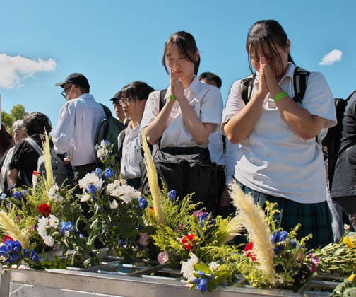 People pray after the ceremony for the atomic bomb victims at Hiroshima Peace Memorial Park marking the 81th anniversary of the atomic bombing of Hiroshima, Japan on Thursday, August 6, 2026.  TKP2026080613 KEIZOxMORI