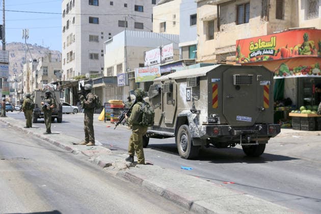 August 6, 2026, Nablus, Palestine: Israeli army forces are patrolling neighborhoods in the Askar refugee camp east of Nablus in the West Bank and raiding shops during a military operation. The raid is part of a broader military campaign targeting refugee camps in the West Bank. The Israeli government has threatened to occupy refugee camps, in areas under the control of Palestinian President Mahmoud Abbas. Nablus Palestine - ZUMAs197 20260806_aaa_s197_105 Copyright: xNasserxishatyehx