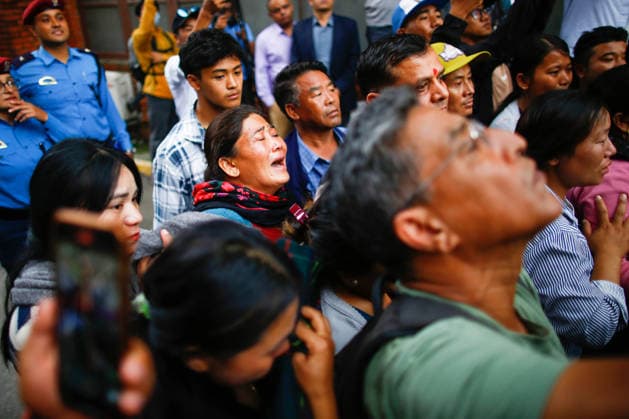 August 6, 2026, Kathmandu, Nepal: Relatives mourn after the body of renowned Nepali mountaineer Pur Bahadur Gurung (Yukta) arrives at Tribhuvan International Airport. Vice President of the Nepal Mountaineering Association, Gandaki Province, was among the climbers killed in an avalanche on Broad Peak in Pakistan and was the first victim to be recovered from the avalanche site. Kathmandu Nepal  - ZUMAhe B 20260806_mda_s197_174 Copyright: xSkandaxGautamx