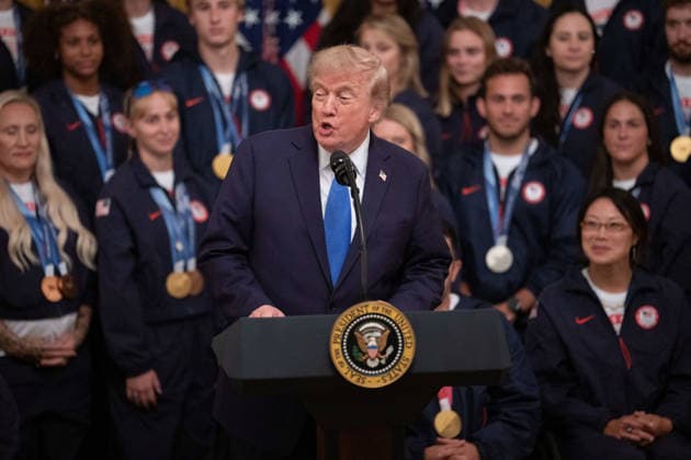President Trump Hosts Team USA Olympians at White House United States President Donald J Trump gives remarks in the East Room of the White House in Washington, DC, USA, on Thursday, August 6, 2026. President Trump is hosting a ceremony for Team USA Olympians who competed in the 2026 Olympic Winter Games in Italy. Credit: Aaron Schwartz Pool via CNP Washington District of Columbia United States  Copyright: xPool ABACAx