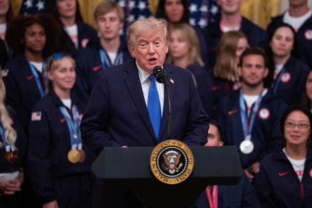 President Trump Hosts Team USA Olympians at White House United States President Donald J Trump gives remarks in the East Room of the White House in Washington, DC, USA, on Thursday, August 6, 2026. President Trump is hosting a ceremony for Team USA Olympians who competed in the 2026 Olympic Winter Games in Italy. Credit: Aaron Schwartz Pool via CNP Washington District of Columbia United States  Copyright: xPool ABACAx