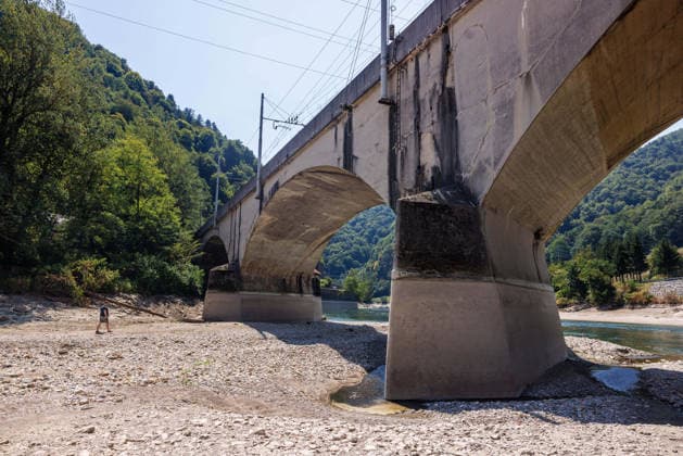 August 6, 2026, Zidani Most, Slovenia: A mostly dry riverbed of Savinja river near its confluence with Sava river is seen in Zidani Most. Slovenia faces record low water levels due to longlasting drought and a recent heatwave, causing the KrÅ¡ko Nuclear Power Plant to reduce power and a temporary suspension of fishing on several rivers. Zidani Most Slovenia - ZUMAs197 20260806_aaa_s197_190 Copyright: xLukaxDakskoblerx