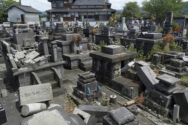 Aftermath of strong earthquake in Kumamoto Photo taken on Aug. 6, 2026, shows collapsed gravestones at a cemetery in Yatsushiro, Kumamoto Prefecture, after a powerful earthquake struck the southwestern Japan prefecture on July 28.  A14AA0005625291P