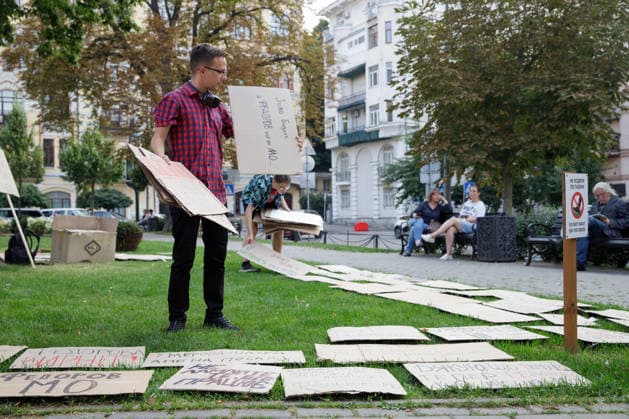 Activists place cardboard placards on the lawn during a peaceful protest against the dismissal of Mykhailo Fedorov from the post of Ukraine’s Defence Minister in Ivana Franka Square outside the Ivan Franko National Academic Drama Theatre, close to the Office of the President, Kyiv, Ukraine, August 6, 2026. Large-scale cardboard rallies in support of former Defence Minister Mykhailo Fedorov have been held in Kyiv and other cities across Ukraine for 22 consecutive days. On 14 July 2026, the Ukrainian Parliament accepted the resignation of Prime Minister Yuliia Svyrydenko, leading to the resignation of the Cabinet. On 15 July 2026, President Volodymyr Zelenskyy dismissed Defence Minister Mykhailo Fedorov, sparking widespread protests across  Copyright: xMariannaxKotykx