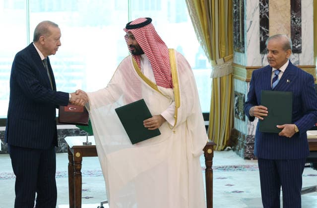 Turkiye, Saudi Arabia and Pakistan sign trilateral joint defense agreement MECCA, SAUDI ARABIA - AUGUST 7: (----EDITORIAL USE ONLY - MANDATORY CREDIT - TURKISH PRESIDENCY MURAT CETINMUHURDAR HANDOUT - NO MARKETING NO ADVERTISING CAMPAIGNS - DISTRIBUTED AS A SERVICE TO CLIENTS----) Turkish President Recep Tayyip Erdogan (L), Saudi Crown Prince Mohammed bin Salman (C) and Pakistani Prime Minister Shehbaz Sharif (R) sign a trilateral joint defense agreement in Mecca, Saudi Arabia, on August 7, 2026. TUR Presidency Murat Cetinmuhurdar Anadolu Mecca Saudi Arabia. Editorial use only. Please get in touch for any other usage.  Copyright: x2026xAnadoluxTURxPresidencyx MuratxCetinmuhurdarx