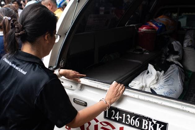 August 7, 2026, Nonthaburi, Thailand: A relative looking at the body of the victim who was killed in the school mass shooting at the scene..At least 7 people, including the gunman, died in a school mass shooting. A 14-year-old student started by killing his grandparents at their home, then opened fire at the school before killing himself. Nonthaburi Thailand - ZUMAs197 20260807_aaa_s197_015 Copyright: xPeeraponxBoonyakiatx