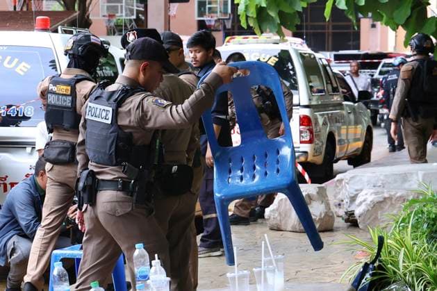 (260807) -- NONTHABURI , Aug. 7, 2026 -- Police officers are on duty outside Debsirin Nonthaburi School in Nonthaburi province, Thailand, Aug. 7, 2026. Thai Prime Minister Anutin Charnvirakul said on Friday afternoon that eight people were confirmed dead, including the gunman and his grandparents, and over 30 people were injured, with nine in critical condition, as a gunman opened fire at a school and home in Nonthaburi province earlier the day. Local police were notified around 10 a.m. local time after a gunman opened fire at Debsirin Nonthaburi School in the Bang Kruai district of Nonthaburi province on the northwestern outskirts of Bangkok. Anutin also said such an incident must not be allowed to happen again, noting that the government 