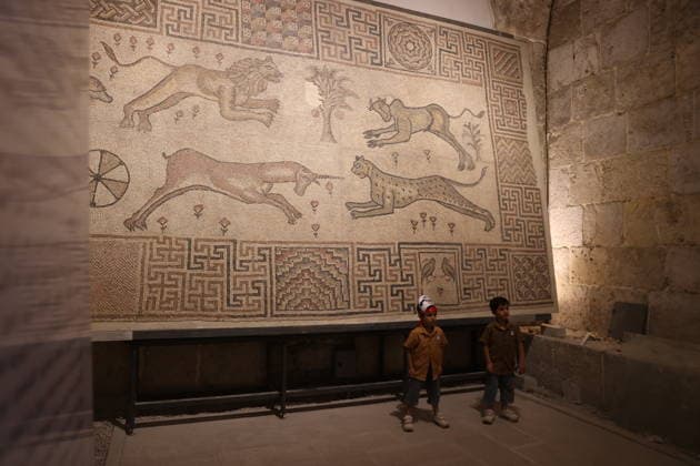 Syria exhibits antiquities returned from France at Damascus Citadel DAMASCUS, SYRIA - AUGUST 7: Artifacts returned by France are displayed at the Throne Hall inside the Citadel of Damascus during a summer festival in Damascus, Syria on August 7, 2026. The historical items belonging to Syria, which were smuggled out of the country approximately 15 years ago, were returned to Syria simultaneously with French President Emmanuel Macron s visit to Damascus. The exhibition featured funerary statues from Palmyra, relief inscriptions, and various artifacts dating back to the Roman period. Izz Aldien Alqasem Anadolu Damascus Syria. Editorial use only. Please get in touch for any other usage.  Copyright: x2026xAnadoluxIzzxAldienxAlqasemx