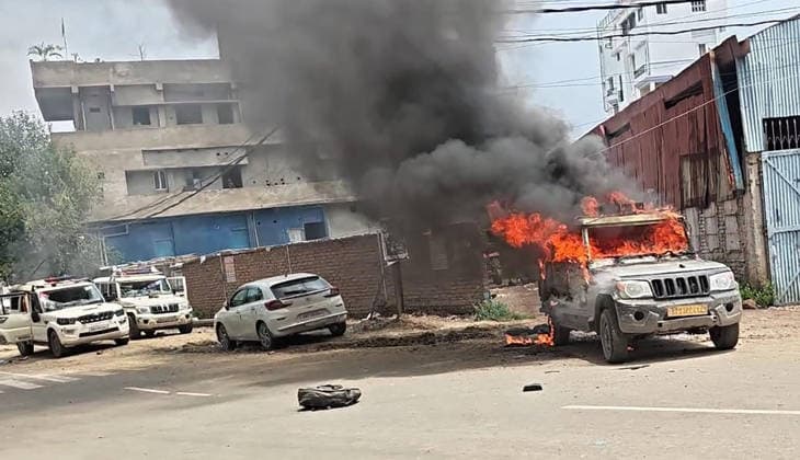 PATNA, INDIA - AUGUST 7: Police vehicles set ablaze by an angry mob after a speeding bus struck and fatally ran over a 22-year-old local resident Manish Kumar along National Highway 30 near the Zero Mile intersection under the Agamkuan police station limits on August 7, 2026 in Patna, India. Incensed by the fatal hit-and-run incident, angry residents and eyewitnesses staged a road blockade, vandalized passing vehicles including public transport bus, three police vehicles, and several two-wheelers. The mob also pelted stones at responding law enforcement teams.(Photo by Santosh Kumar Hindustan Times) Angry Mob Torches Bus, Police Vehicles After Youth Killed by Speeding Bus In Patna