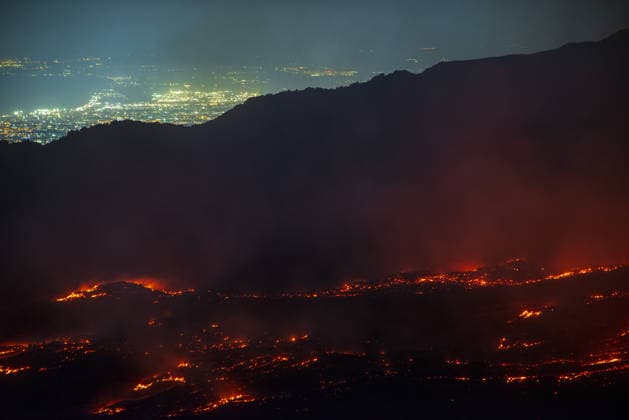 Volcanic activity intensifies at Mount Etna CATANIA, ITALY - AUGUST 8: Mount Etna enters a new paroxysmal phase characterized by intense activity at the Voragine summit crater in Catania, Sicily, Italy on August 8, 2026. The volcanic activity, which began to rapidly intensify during the evening of August 6, evolved into a powerful lava fountain overnight and into August 7. The eruption generated a significant ash cloud dispersing towards the southeast, with ashfall reported in the surrounding towns of Ragalna and Adrano. Additionally, a new lava flow was observed in the Valle del Leone from a new eruptive vent opened at an altitude of approximately 2750. The presence of volcanic ash and the elevation of the aviation alert to red severely im  Copyright: x2026xAnadoluxSalvatorexAllegrax
