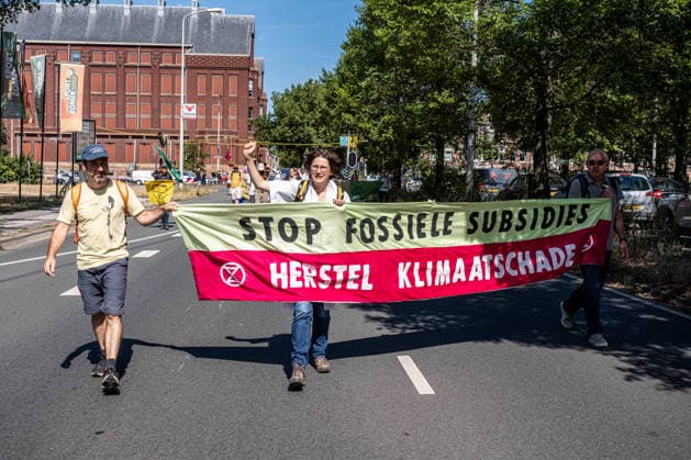 August 8, 2026, The Hague, South-Holland, The Netherlands: Extinction Rebellion activists stage an unannounced blockade of the A12 highway in The Hague, the Netherlands, in response to severe wildfires in the Netherlands. The activists are demanding that the Dutch government end fossil fuel subsidies. The Hague The Netherlands - ZUMAg281 20260808_zaf_g281_006 Copyright: xStormxGroenendijkx