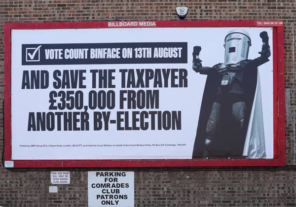 August 8, 2026, Clacton-On-Sea, Essex, UK: Clacton-On-Sea, UK. UK. A large Count Binface advertising billboard is displayed on the side of a building, in Clacton-On-Sea, Essex. Count Binface is a candidate in the upcoming by-election. Nigel Farage has resigned his seat and is now campaigning to be re-elected in the Clacton constituency at the upcoming by-election on the 13th August. Clacton-On-Sea UK  - ZUMAl94_ 20260808_zaf_l94_012 Copyright: xJacquelinexLawriex