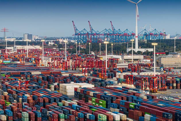 Container terminals in the Port of Hamburg at dusk; view of the EUROGATE Container Terminal Hamburg with container storage areas; symbolic image representing shipping, logistics, global trade, and container handling; Hamburg, Germany, August 5, 2026; Hamburg, Germany DJI_20260805210209_0937_D_DAN