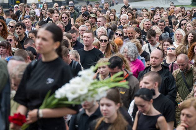 Hundreds attend the funeral of search and rescue volunteer Oleksii Yukov in Kyiv KYIV, UKRAINE - AUGUST 08: Hundreds attend the funeral of search and rescue volunteer Oleksii Yukov in Kyiv, Ukraine, on August 08, 2026. Yukov was killed during a mission to retrieve the bodies of fallen Ukrainian soldiers in Donetsk region of Ukraine. Yukov had been conducting search and rescue missions to retrieve bodies of fallen Ukrainian soldiers sjnce 2014. Danylo Antoniuk Anadolu Kyiv Ukraine. Editorial use only. Please get in touch for any other usage.  Copyright: x2026xAnadoluxDanyloxAntoniukx