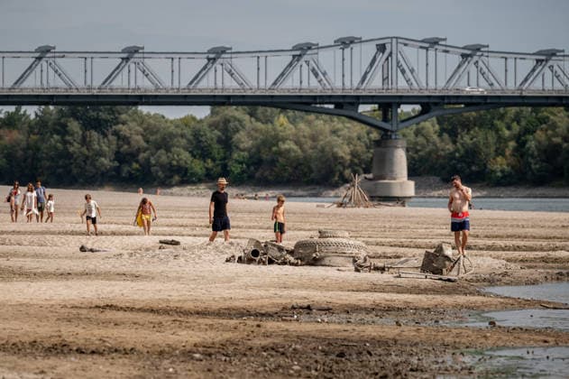 Remains of an old World War II-era ship in Hungary BAJA, HUNGARY – AUGUST 8: People gather along the exposed riverbed of the Danube, after exceptionally low water levels revealed the remains of an old World War II-era ship from the riverbed in Baja, Hungary on August 8, 2026. The emergence of the wreck has attracted hundreds of curious visitors to the site. Robert Nemeti Anadolu Baja Hungary. Editorial use only. Please get in touch for any other usage.  Copyright: x2026xAnadoluxRobertxNemetix