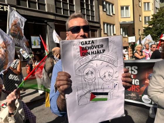Protesters gather in Stockholm to condemn Israeli military strikes in Gaza and Lebanon STOCKHOLM, SWEDEN - AUGUST 08: Demonstrators hold banners and Palestinian flags during a protest at Odenplan Square in Stockholm, Sweden, on August 08, 2026, condemning Israeli military operations in Gaza and Lebanon. Organized by several civil society groups, protesters rallied against air strikes on civilian infrastructure, schools, and hospitals, calling for an immediate end to the violence and an end to food shortages in the region. Atila Altuntas Anadolu Stockholms Sweden. Editorial use only. Please get in touch for any other usage.  Copyright: x2026xAnadoluxAtilaxAltuntasx