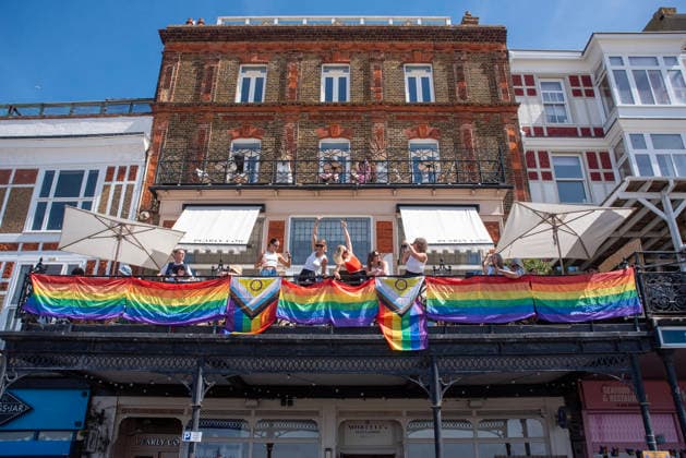 August 8, 2026, Margate, United Kingdom: People celebrate the Margate Pride on the balcony of the No.42 hotel. Gays, trans and non-binary people gathered in Margate, UK to celebrate the 10th Margate Pride. The crowd paraded from the East side of the town to the town centre. Margate United Kingdom - ZUMAs197 20260808_aaa_s197_152 Copyright: xKrisztianxElekx