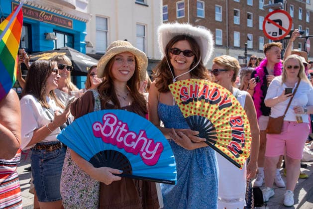 August 8, 2026, Margate, United Kingdom: Two spectators of the Margate Pride pose for a photo with their fans. Gays, trans and non-binary people gathered in Margate, UK to celebrate the 10th Margate Pride. The crowd paraded from the East side of the town to the town centre. Margate United Kingdom - ZUMAs197 20260808_aaa_s197_163 Copyright: xKrisztianxElekx