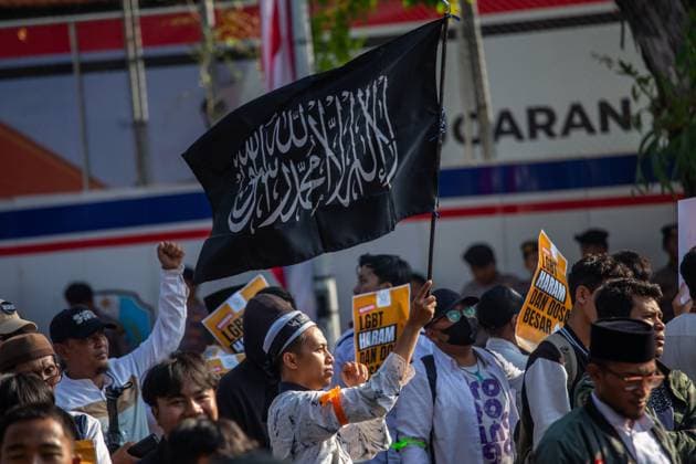 August 9, 2026, Surabaya, Indonesia: SURABAYA, Indonesia Ã¢â‚¬ August 9, 2026: Thousands of demonstrators affiliated with the Alliance of Communities Concerned for the Generation gather on Governor Suryo Street during a rally opposing LGBTQ rights. Participants carried flags and banners expressing opposition to lesbian, gay, bisexual, transgender, and queer (LGBTQ) people and related issues. Surabaya Indonesia - ZUMAq101 20260809_zna_q101_001 Copyright: xMuhammadxIffanxMaulanax