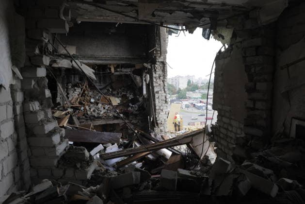 Russian Drone Strike On Residential Building - Kharkiv Interior view of a heavily damaged multi-story residential building in Kharkiv showing destroyed floors, collapsed ceilings, twisted metal reinforcement, and debris scattered throughout the structure, with a view through the opening to the city and neighboring buildings beyond, on August 9, 2026. A drone strike hit the building in the Saltivka district, destroying multiple floors, killing two people and wounding dozens more, according to city officials. Photo by Yevhen Titov ABACAPRESS.COM Kharkiv Kharkiv Oblast Ukraine  Copyright: xTitovxYevhen ABACAx