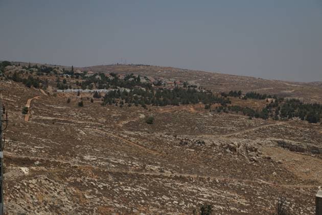 August 9, 2026, West Bank, PS: WEST BANK, Palestine Ã¢â‚¬ August 9, 2026: Views show the Israeli settlement of Kochav Ya akov and surrounding land belonging to the Palestinian town of Kafr Aqab, north of Jerusalem. The Israel Land Authority has issued a tender for the construction of 627 new housing units in the settlement. West Bank PS  - ZUMAq101 20260809_zna_q101_034 Copyright: xMohammedxSomrainx