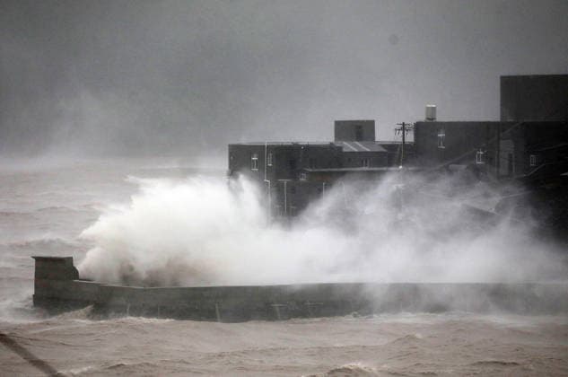 YUHUAN, CHINA - AUGUST 09: Huge waves crash as Typhoon Nari makes landfall at Kanmen in Yuhuan on August 9, 2026 in Yuhuan, Zhejiang Province of China. The strong typhoon brought heavy winds and rain to the coastal area.  Copyright: xVCGx 111658985336