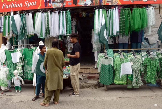 RECORD DATE NOT STATED Pakistan flags, buntings, clothes and other items are being selling in connection of 79th Independence Day of Pakistan, at Sir Syed road in Rawalpindi on Sunday, August 9, 2026. (Zubair Abbasi PPI Images). EDITORIAL USE ONLY Copyright: xx SA-ZM-090826x ppiphotos485073
