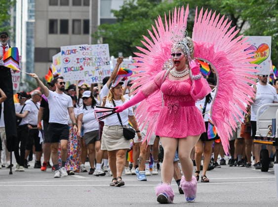 August 9, 2026, Montreal, Pq, Canada: A participant entertains the crowd during the Pride parade in Montreal, on Sunday, Aug. 9, 2026. Montreal Canada  - ZUMAc35_ 20260809_zaf_c35_020 Copyright: xGrahamxHughesx