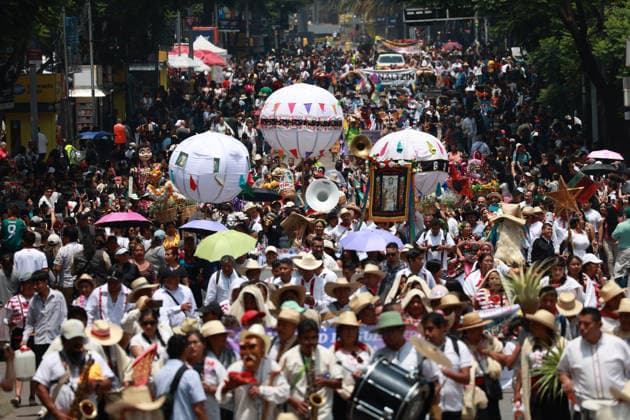 Mexico City marks International Day of the World s Indigenous Peoples MEXICO CITY, MEXICO - AUGUST 09: Participants wearing traditional regional attire perform during the Mega Calenda parade marking the International Day of the World s Indigenous Peoples, on Reforma Avenue, in Mexico City, Mexico on August 09, 2026. ??Hundreds of participants from different indigenous communities in Mexico gathered to celebrate their traditions and commemorate the International Day of the World s Indigenous Peoples, calling for the recognition of their rights, autonomy, and cultural heritage. Daniel Cardenas Anadolu Mexico City Mexico. Editorial use only. Please get in touch for any other usage.  Copyright: x2026xAnadoluxDanielxCardenasx