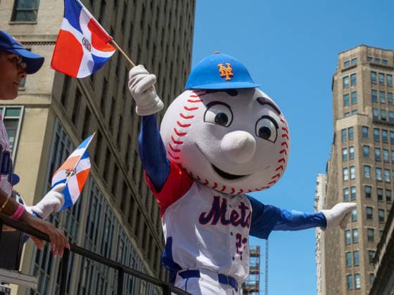 August 9, 2026, New York, New York, USA: Mr. Met along with Dominican pride on display at the 44th annual Dominican Day Parade on Sixth Avenue..With the theme of Identity and Culture under a blazing sun thousands marched and watched .as merengue, bachata music, colorful floats and traditional dance groups made their way up.the avenue. New York USA  - ZUMAh156 20260809_znp_h156_010 Copyright: xMiloxHessx