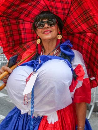 August 9, 2026, New York, New York, USA: Dominican pride on display at the 44th annual Dominican Day Parade on Sixth Avenue..With the theme of Identity and Culture under a blazing sun thousands marched and watched .as merengue, bachata music, colorful floats and traditional dance groups made their way up.the avenue. New York USA - ZUMAh156 20260809_znp_h156_009 Copyright: xMiloxHessx