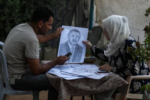 August 10, 2026, Gaza City, Palestine, State of: GAZA Gaza City, GAZA STRIP Ã¢â‚¬ AUGUST 9, 2026: Palestinian artist Nadia Abu Issa creates charcoal drawings depicting the hardships experienced by civilians during the war in Gaza, including shortages of food and water and life under continued displacement and insecurity. Living near an area affected by ongoing military activity, Abu Issa says her artwork aims to document the daily realities faced by Palestinians and preserve their experiences through art. Among her recent works is a portrait of Turkish President Recep Tayyip ErdoÄÅ¸an, which she says she created as a gesture of appreciation for TurkeyÃ¢â‚¬â ¢s support for Palestinians. Gaza City Palestine, State of  - ZUMAq101 20260810_zna_q101_005 Copyright: xRamzixAbuxAmerx