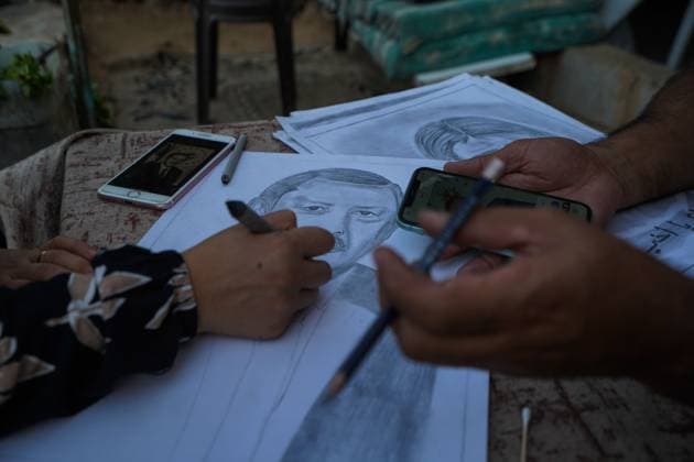 August 9, 2026, Gaza City, Palestine, State of: GAZA Gaza City, GAZA STRIP Ã¢â‚¬ AUGUST 9, 2026: Palestinian artist Nadia Abu Issa creates charcoal drawings depicting the hardships experienced by civilians during the war in Gaza, including shortages of food and water and life under continued displacement and insecurity. Living near an area affected by ongoing military activity, Abu Issa says her artwork aims to document the daily realities faced by Palestinians and preserve their experiences through art. Among her recent works is a portrait of Turkish President Recep Tayyip ErdoÄÅ¸an, which she says she created as a gesture of appreciation for TurkeyÃ¢â‚¬â ¢s support for Palestinians. Gaza City Palestine, State of - ZUMAq101 20260809_zna_q101_140 Copyright: xRamzixAbuxAmerx