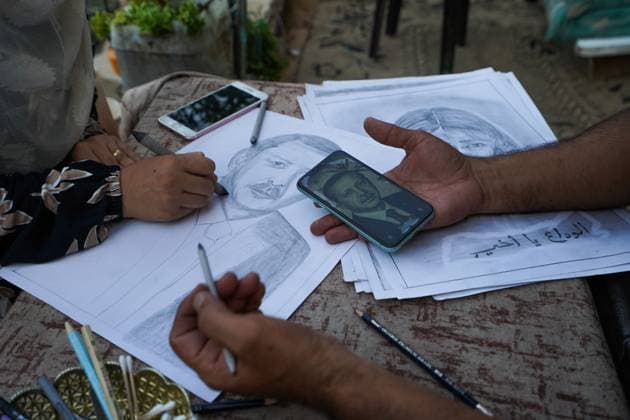 August 9, 2026, Gaza City, Palestine, State of: GAZA Gaza City, GAZA STRIP Ã¢â‚¬ AUGUST 9, 2026: Palestinian artist Nadia Abu Issa creates charcoal drawings depicting the hardships experienced by civilians during the war in Gaza, including shortages of food and water and life under continued displacement and insecurity. Living near an area affected by ongoing military activity, Abu Issa says her artwork aims to document the daily realities faced by Palestinians and preserve their experiences through art. Among her recent works is a portrait of Turkish President Recep Tayyip ErdoÄÅ¸an, which she says she created as a gesture of appreciation for TurkeyÃ¢â‚¬â ¢s support for Palestinians. Gaza City Palestine, State of - ZUMAq101 20260809_zna_q101_147 Copyright: xRamzixAbuxAmerx