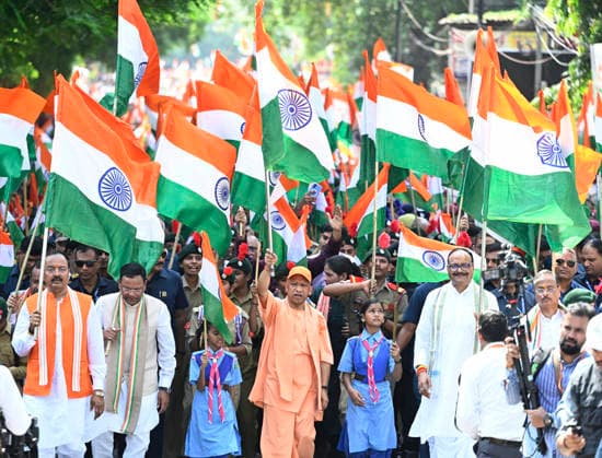 LUCKNOW, INDIA - AUGUST 9: Uttar Pradesh Chief Minister Yogi Adityanath along with deputy CM Keshav Prasad Maurya and deputy CM Brajesh Pathak and BJP state President Pankaj Chaudhary waves national flag during Tiranga Yatra under the Har Ghar Tiranga campaign ahead of the 80th Independence Day on August 9, 2026 in Lucknow, India. (Photo by Deepak Gupta Hindustan Times) UP CM Yogi Adityanath Leads Tiranga Yatra Under Har Ghar Tiranga Campaign Ahead Independence Day