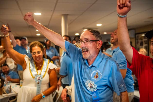 August 9, 2026, Boston, Massachusetts, USA: Patrons dance inside the FishermanÃ¢â‚¬â ¢s club during the Feast of the Madonna Della Cava in the North End of Boston, Massachusetts on August 9, 2026. Boston USA  - ZUMAp158 20260809_aap_p158_017 Copyright: xJosephxPreziosox