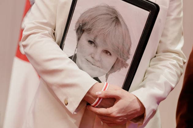 New Belarus Conference in Warsaw - 09 Aug 2026 A portrait of TUT.BY CEO Liudmila Chekina is seen on a folder held by Belarusian democratic leader Sviatlana Tsikhanouskaya during the second day of the New Belarus Conference. The second day of the New Belarus Conference brought together representatives of Belarusian democratic forces, activists, former political prisoners, civil society representatives and international partners. The programme focused on discussions about Belarus, support for Belarusians, regional developments and the role of democratic forces in shaping the country’s future. Warsaw Poland Copyright: xVolhaxShukailax xSOPAxImagesx VSHUKAILA_4646