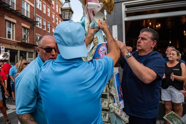 August 9, 2026, Boston, Massachusetts, USA: People pin money to the saintÃ¢â‚¬â ¢s image during the Feast of the Madonna Della Cava in the North End of Boston, Massachusetts on August 9, 2026. Boston USA  - ZUMAp158 20260809_aap_p158_031 Copyright: xJosephxPreziosox